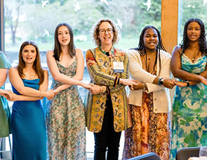 Group of people holding hands. Links to Beneficiary Designations